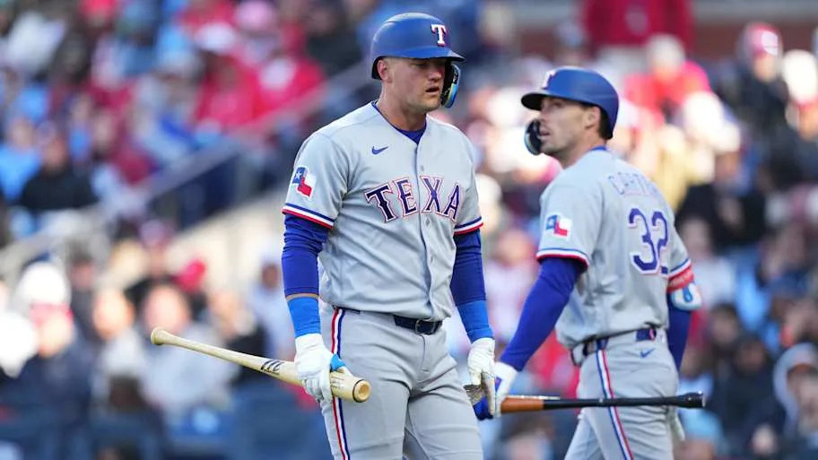 Texas Rangers infielder Josh Jung reacts after striking out.