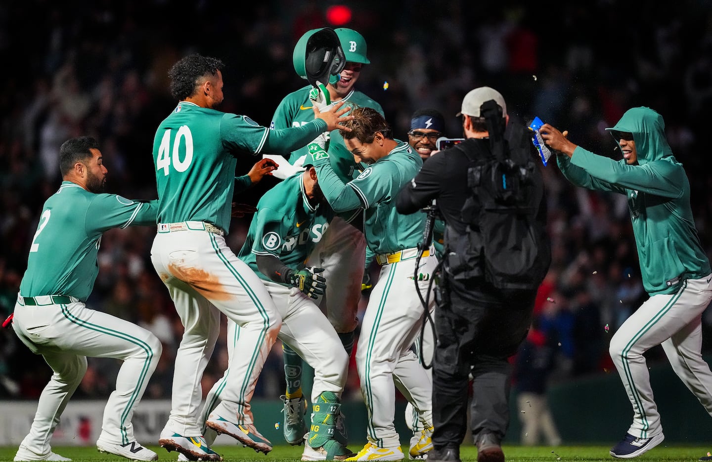 The Red Sox mobbed Masataka Yoshida after his walkoff single in the 10th inning.