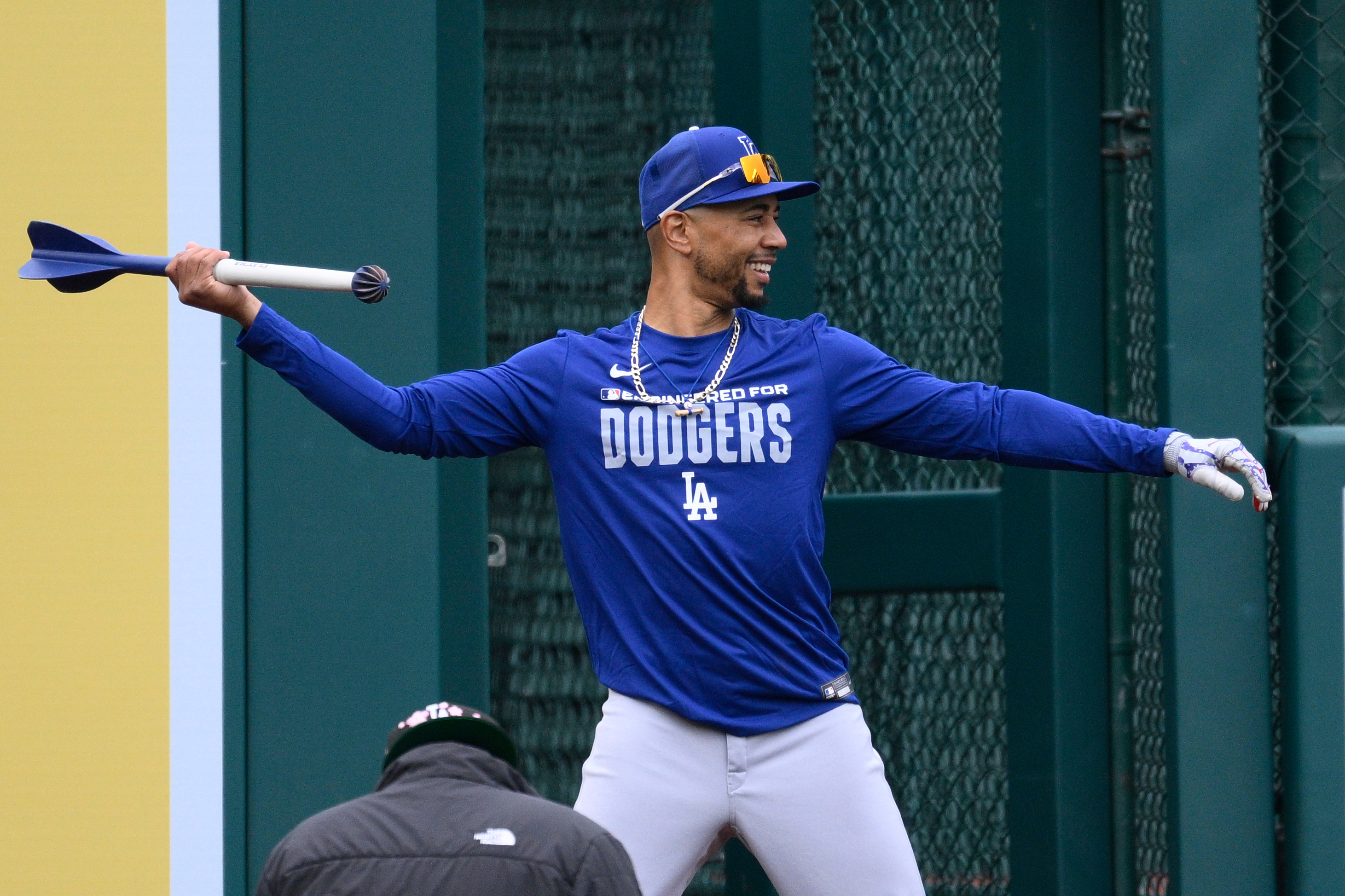 Dodgers shortstop Mookie Betts works out before a game against...