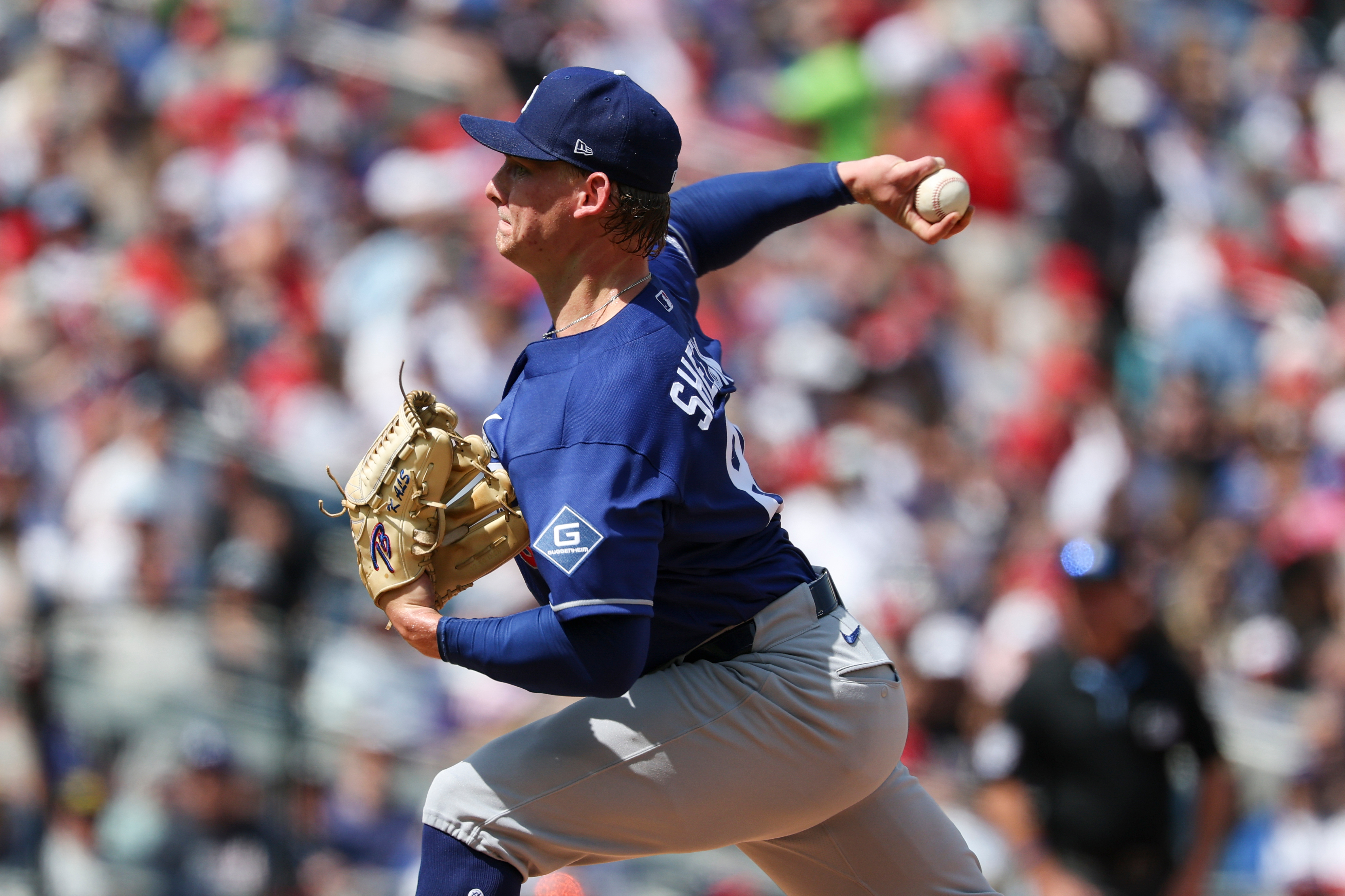 Dodgers starting pitcher Emmet Sheehan throws to the plate during...