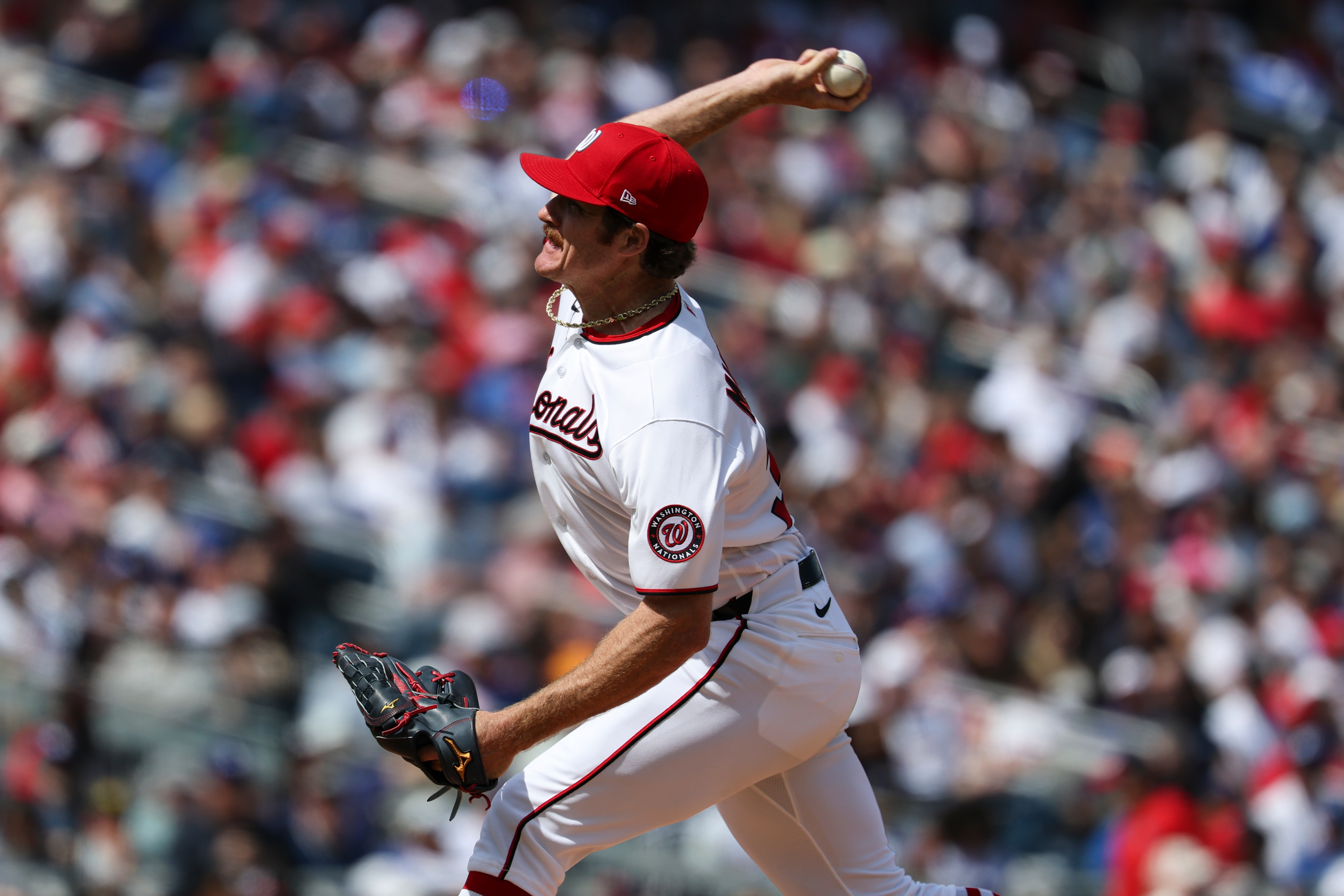 Washington Nationals pitcher Miles Mikolas throws during the third inning...