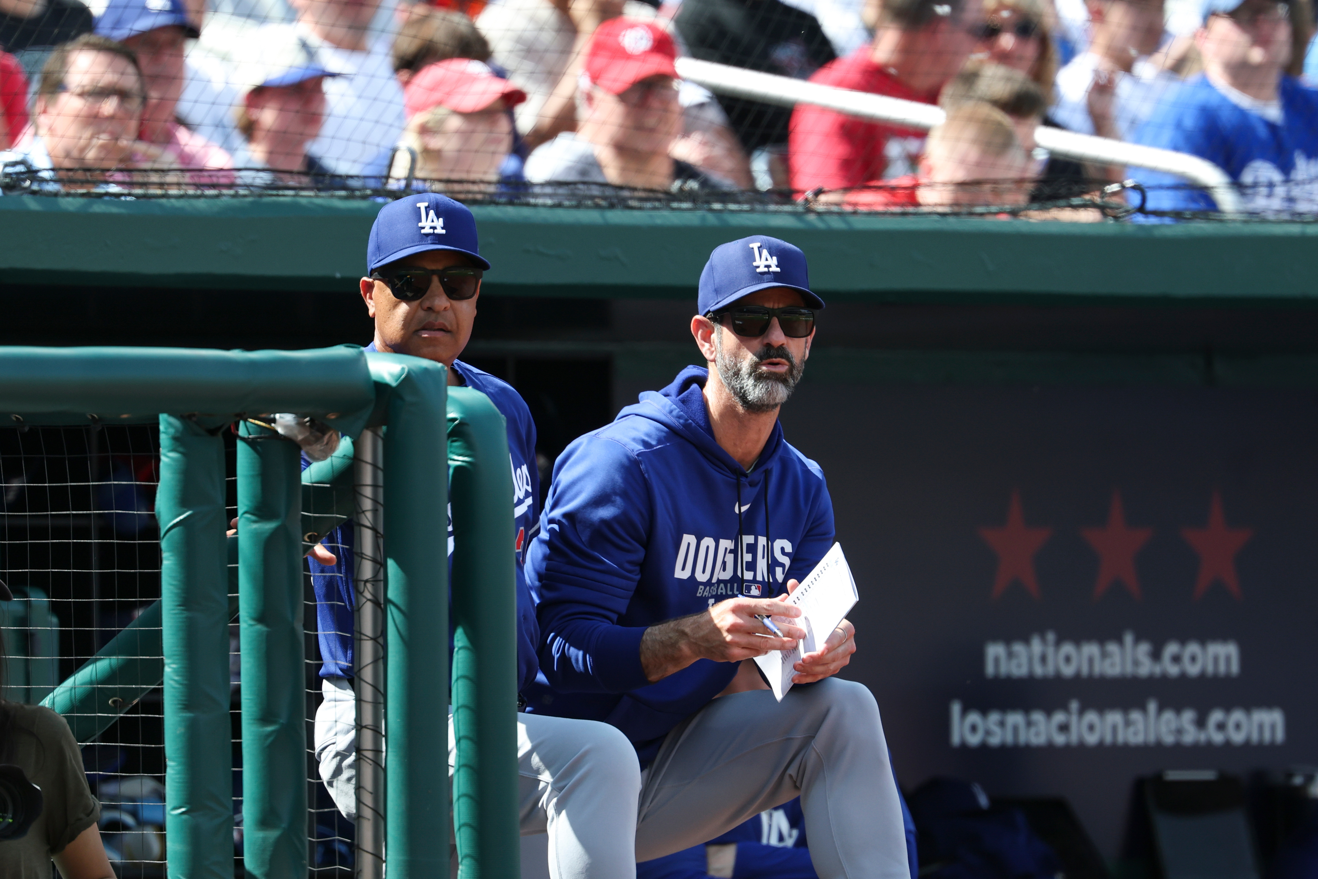 Dodgers manager Dave Roberts, left, and pitching coach Mark Prior,...