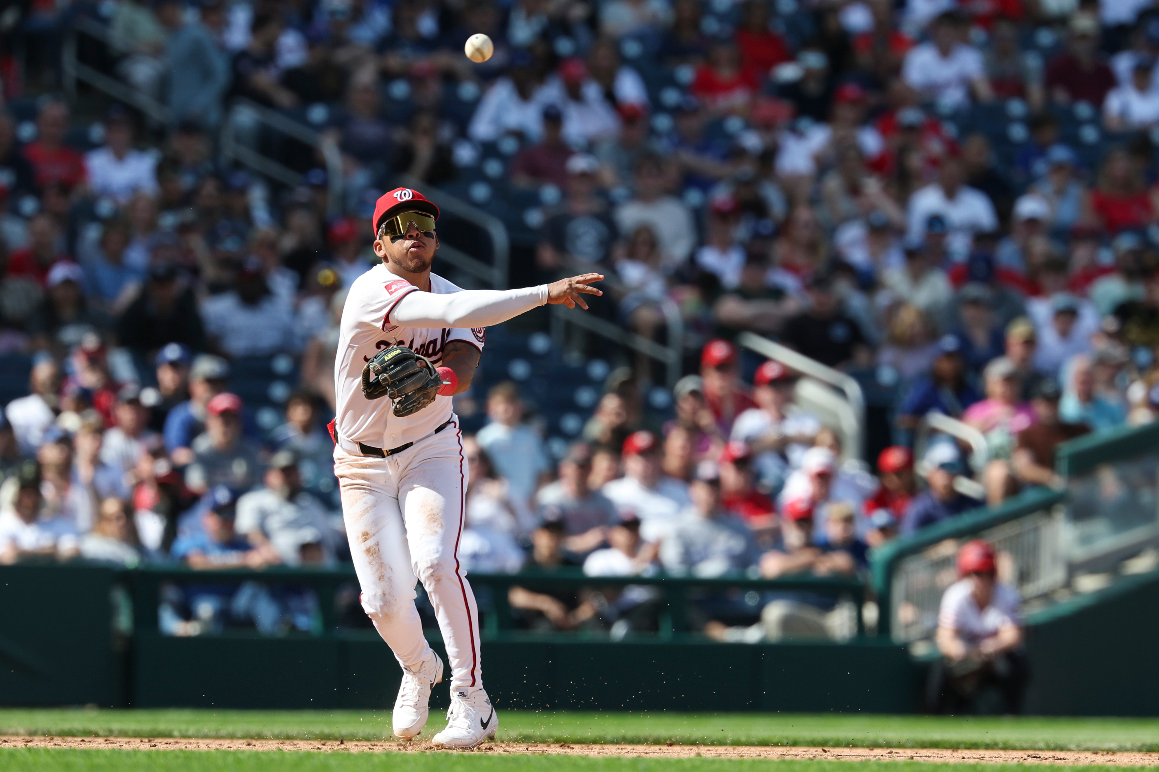 Washington Nationals third baseman Jorbit Vivas throws to first base...