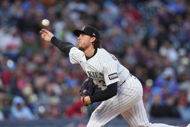 Colorado Rockies relief pitcher Chase Dollander works against the Philadelphia Phillies in the fifth inning of a baseball game Saturday, April 4, 2026, in Denver. (AP Photo/David Zalubowski)