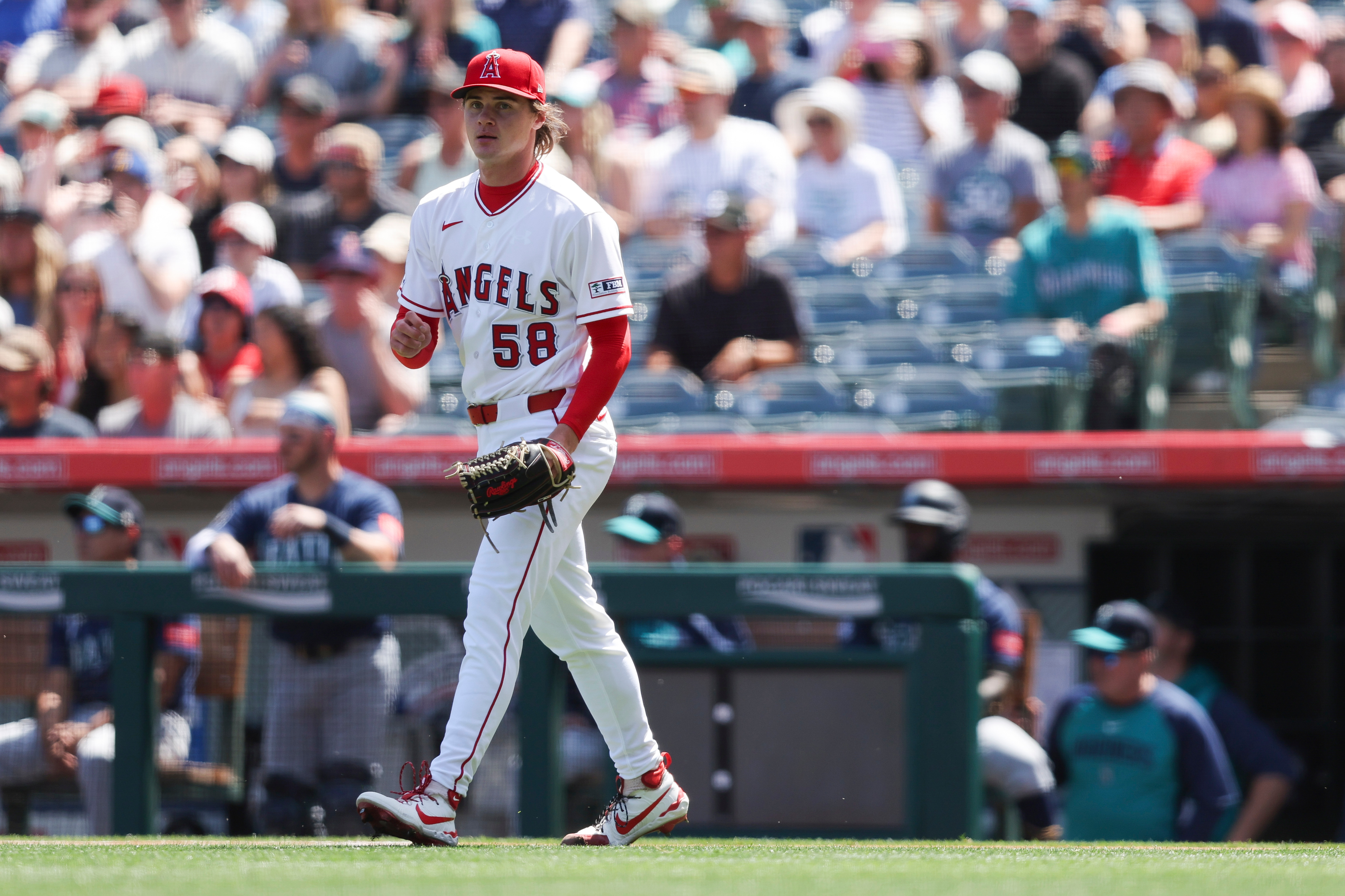 Angels pitcher George Klassen (58) reacts to an out during...