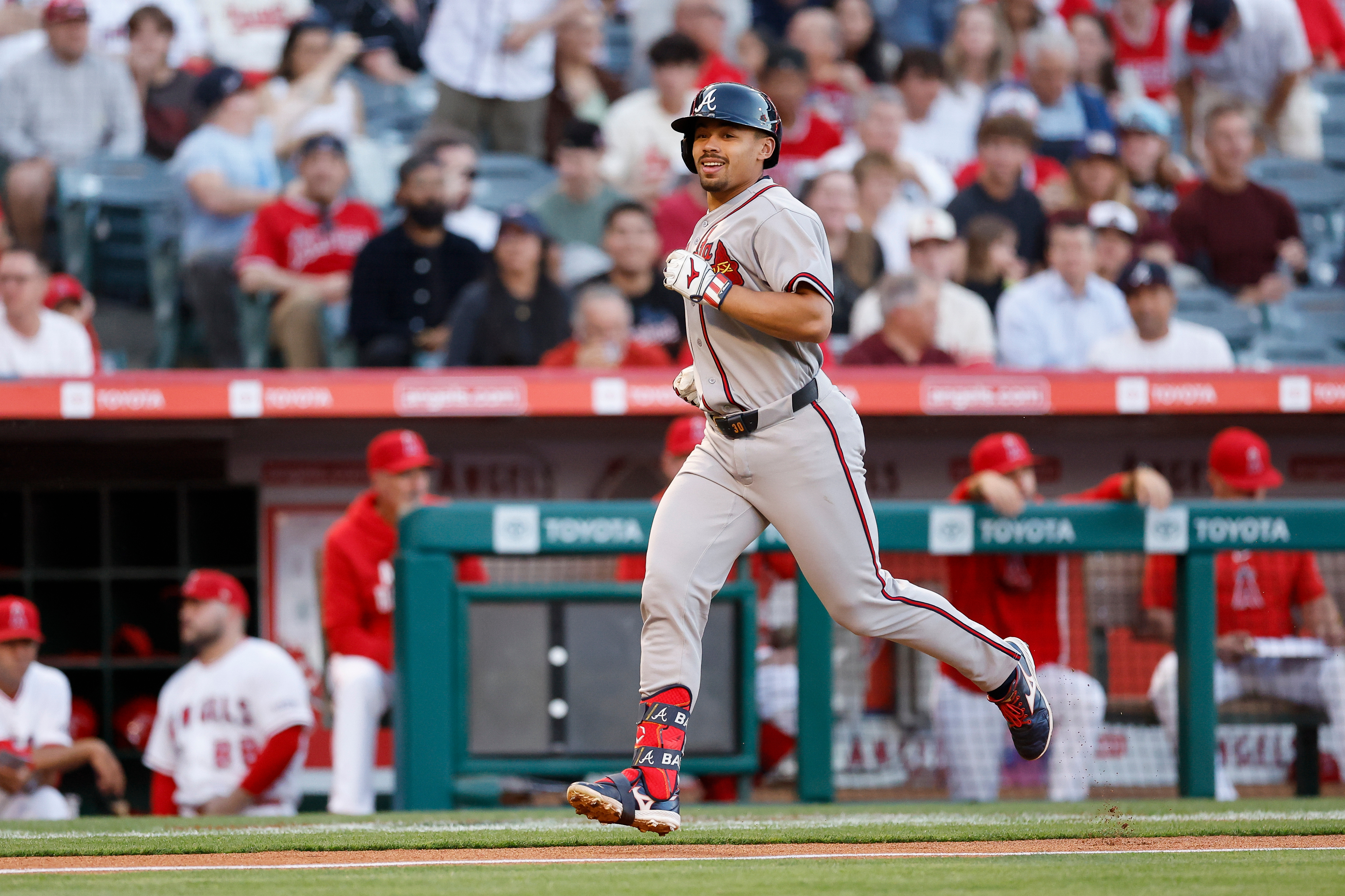 The Atlanta Braves’ Drake Baldwin, foreground, runs the bases after...