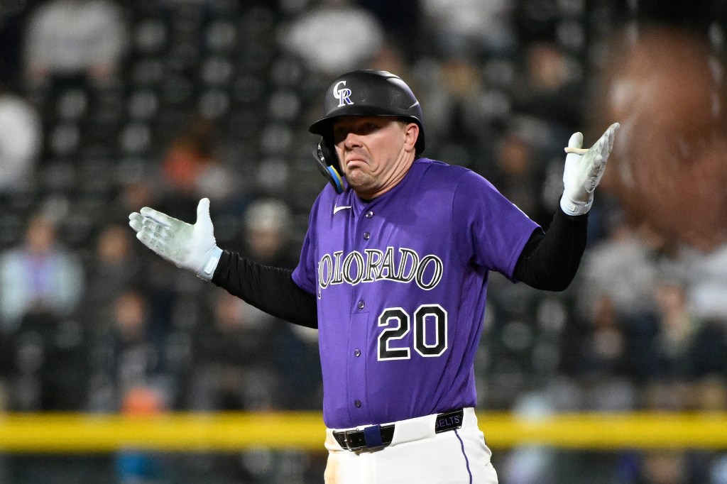 Rockies beat Astros in series opener behind eight-run inning