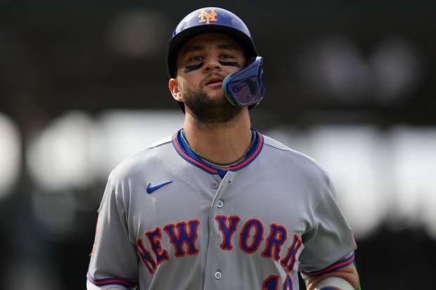 New York Mets' Bo Bichette (19) leaves the field after the top of the seventh inning of a baseball game against the Chicago Cubs, Friday, April 17, 2026, in Chicago.
