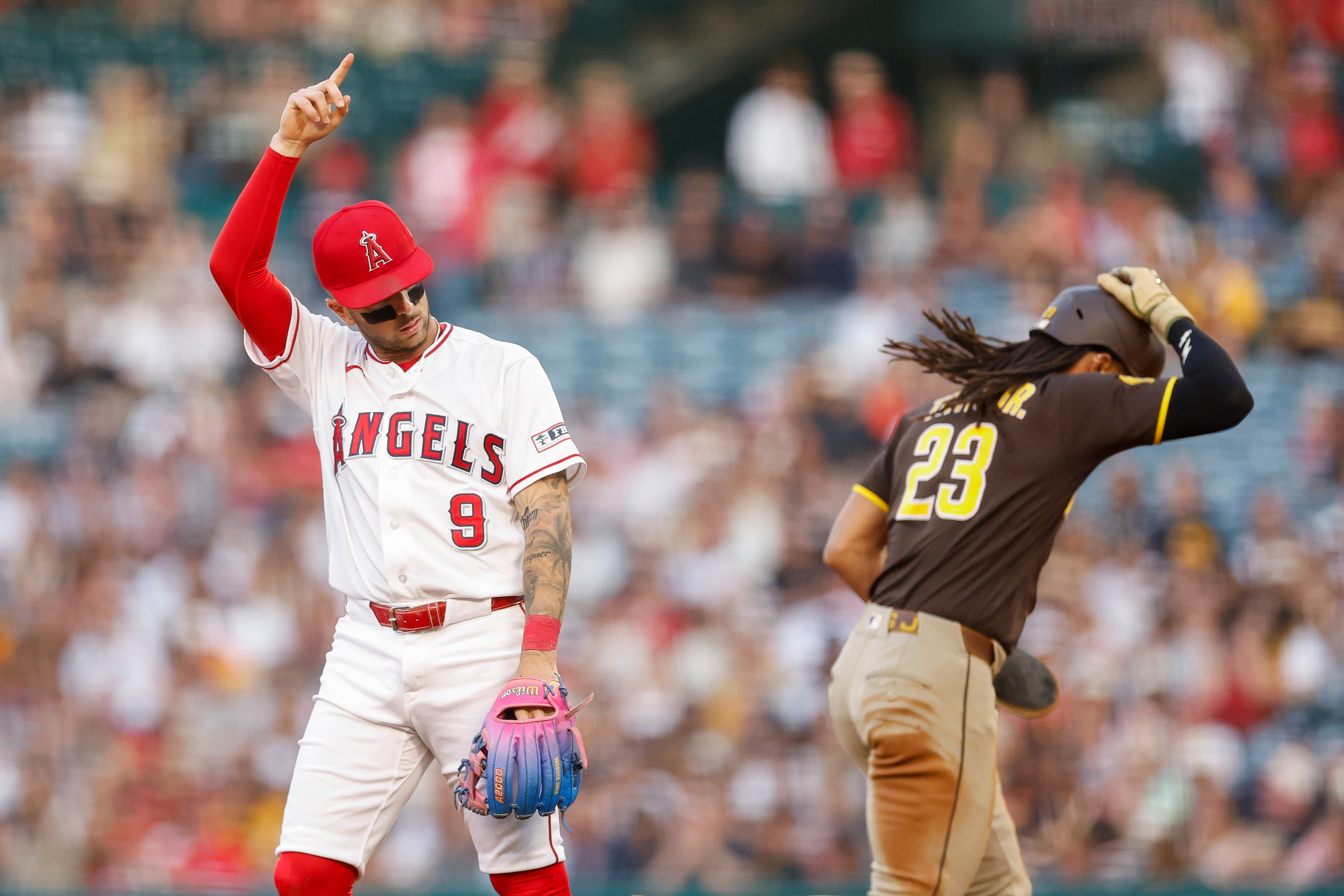 Angels shortstop Zach Neto (9) reacts after getting out San...
