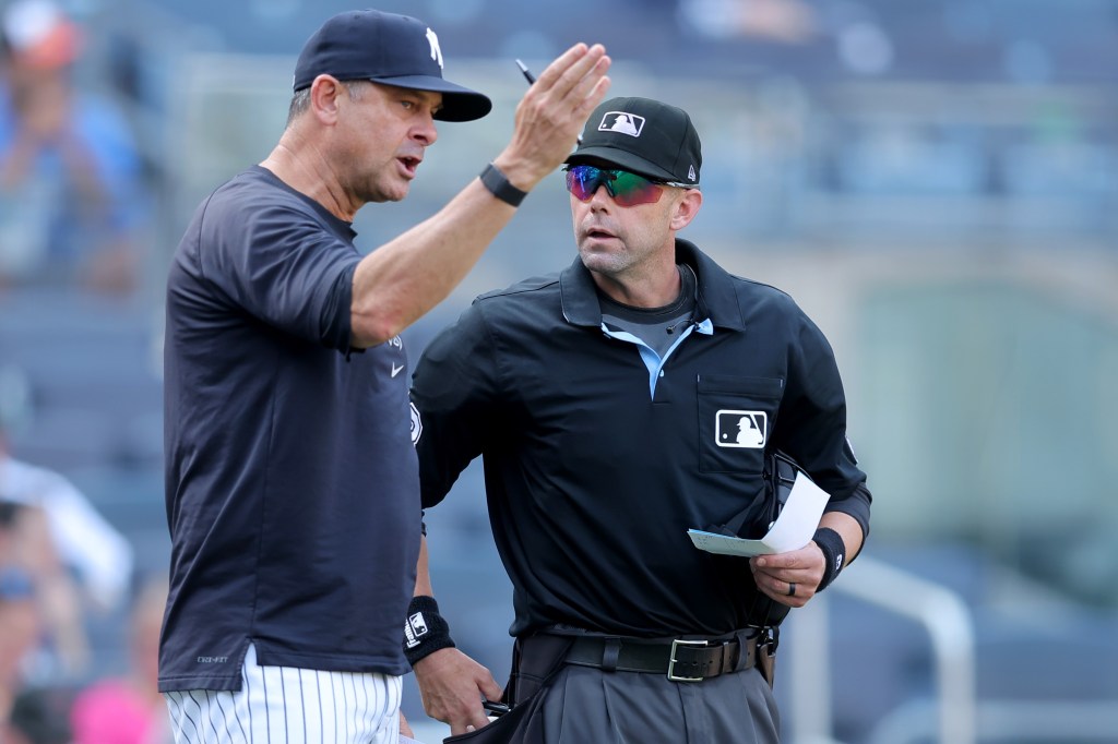 Aaron Boone argues with home plate umpire Will Little in the eighth inning before getting ejected for the first time this season in the Yankees' 11-4 blowout loss to the Angels on April 16, 2024.