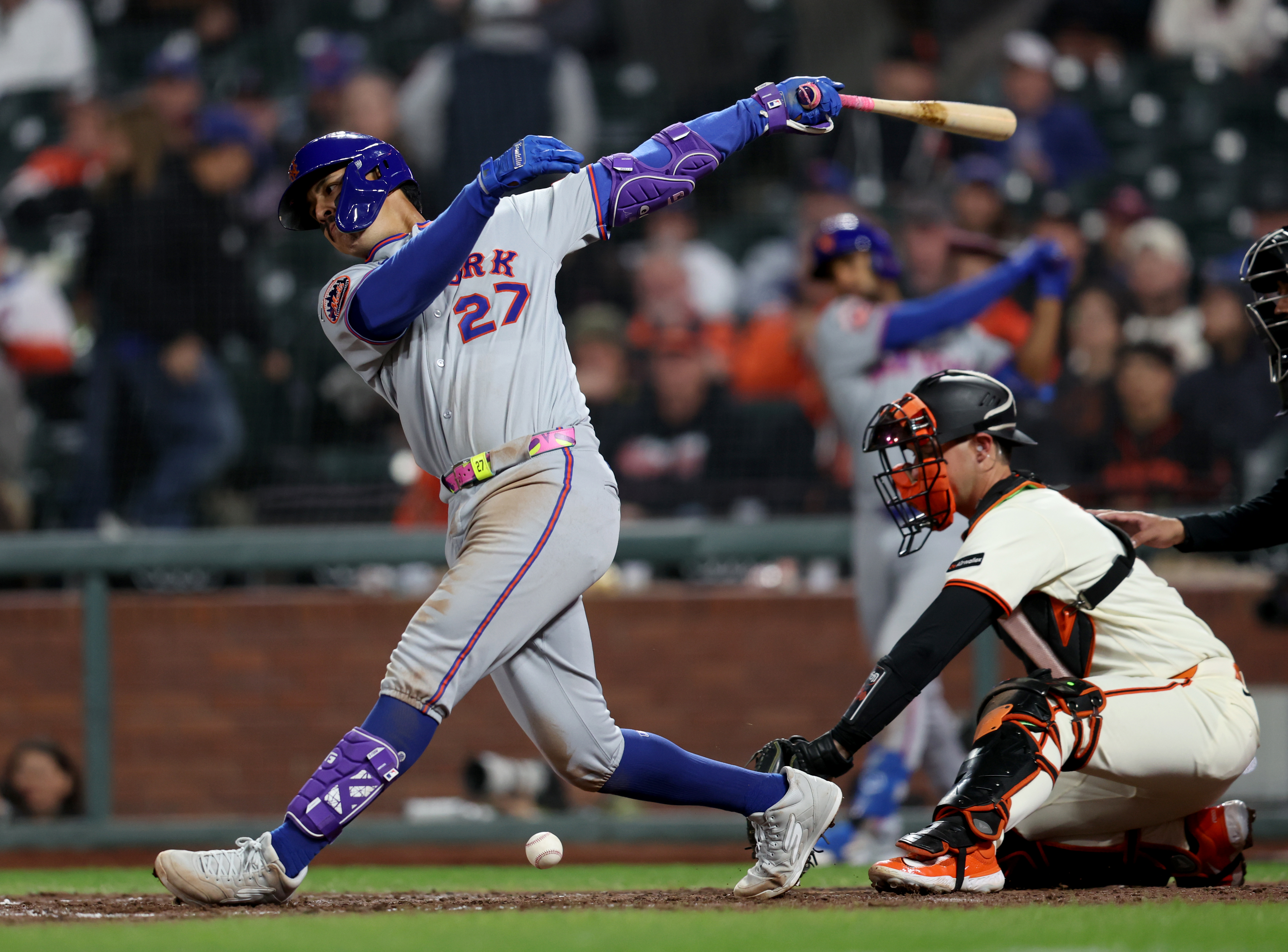 New York Mets' Mark Vientos #27 fouls off a pitch...