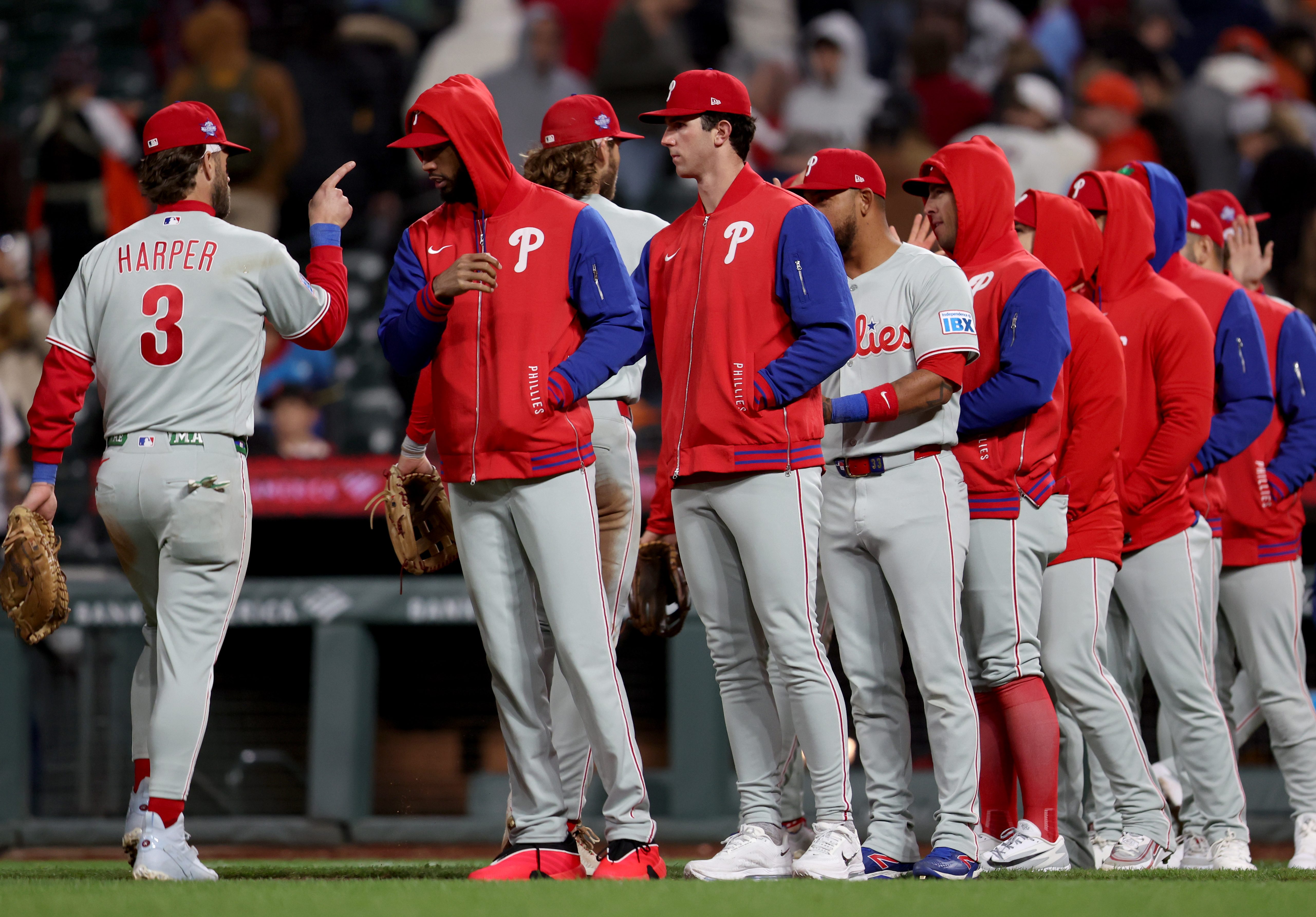 Philadelphia Phillies’ Bryce Harper #3 celebrates with teammates after their...