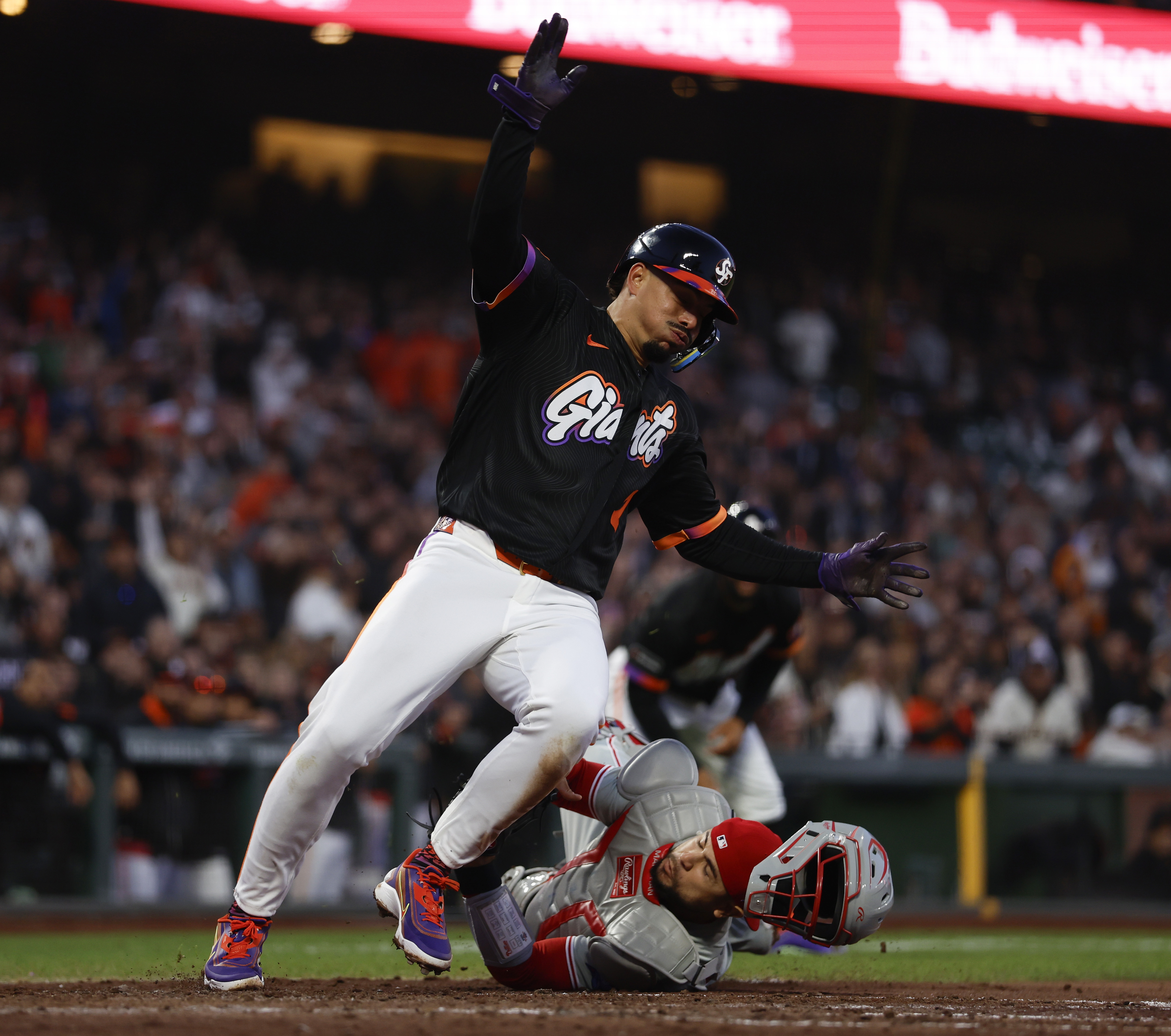 San Francisco Giants’ Willy Adames (2) is tagged out at...