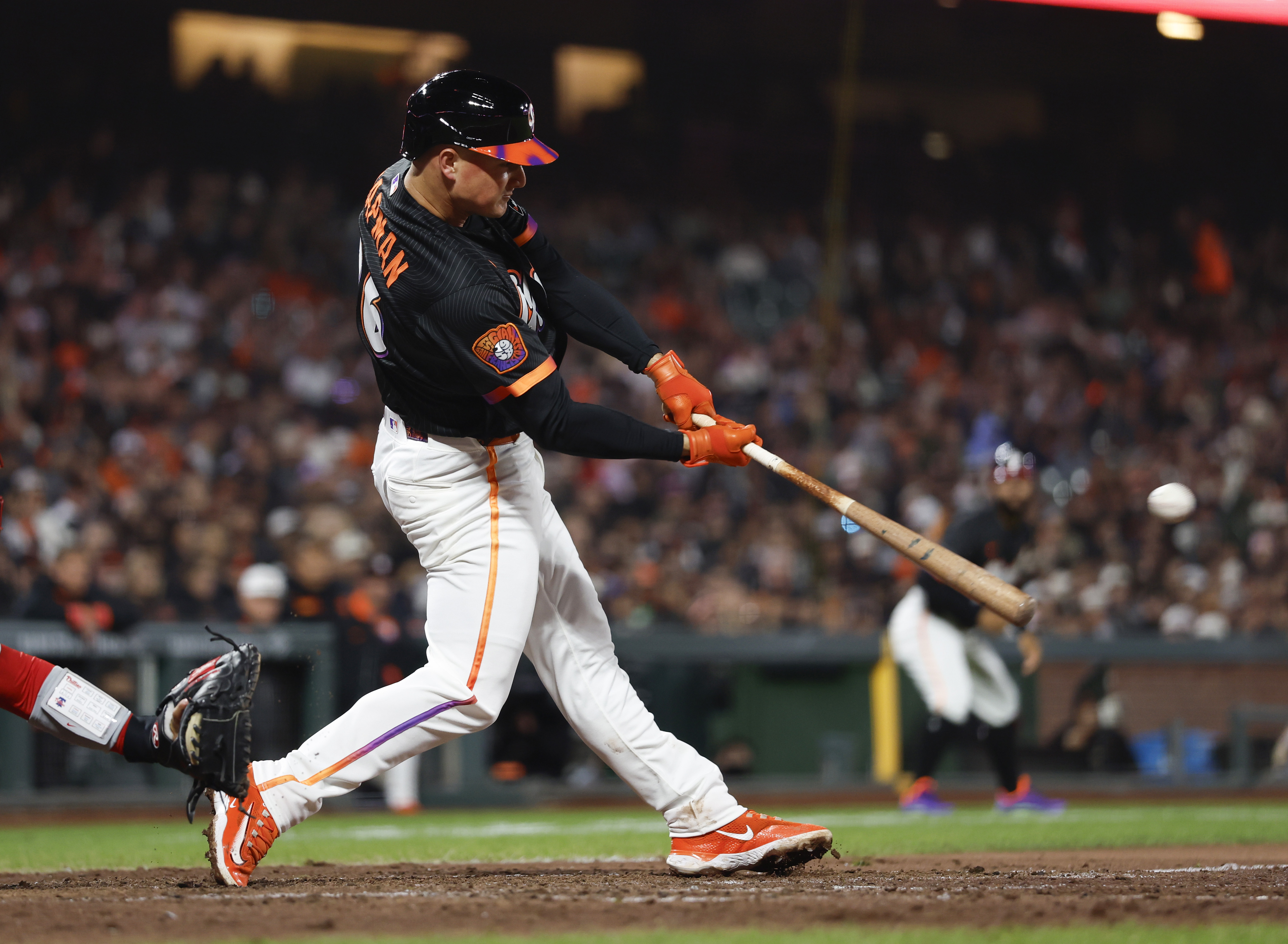 San Francisco Giants’ Matt Chapman (26) hits an RBI double...