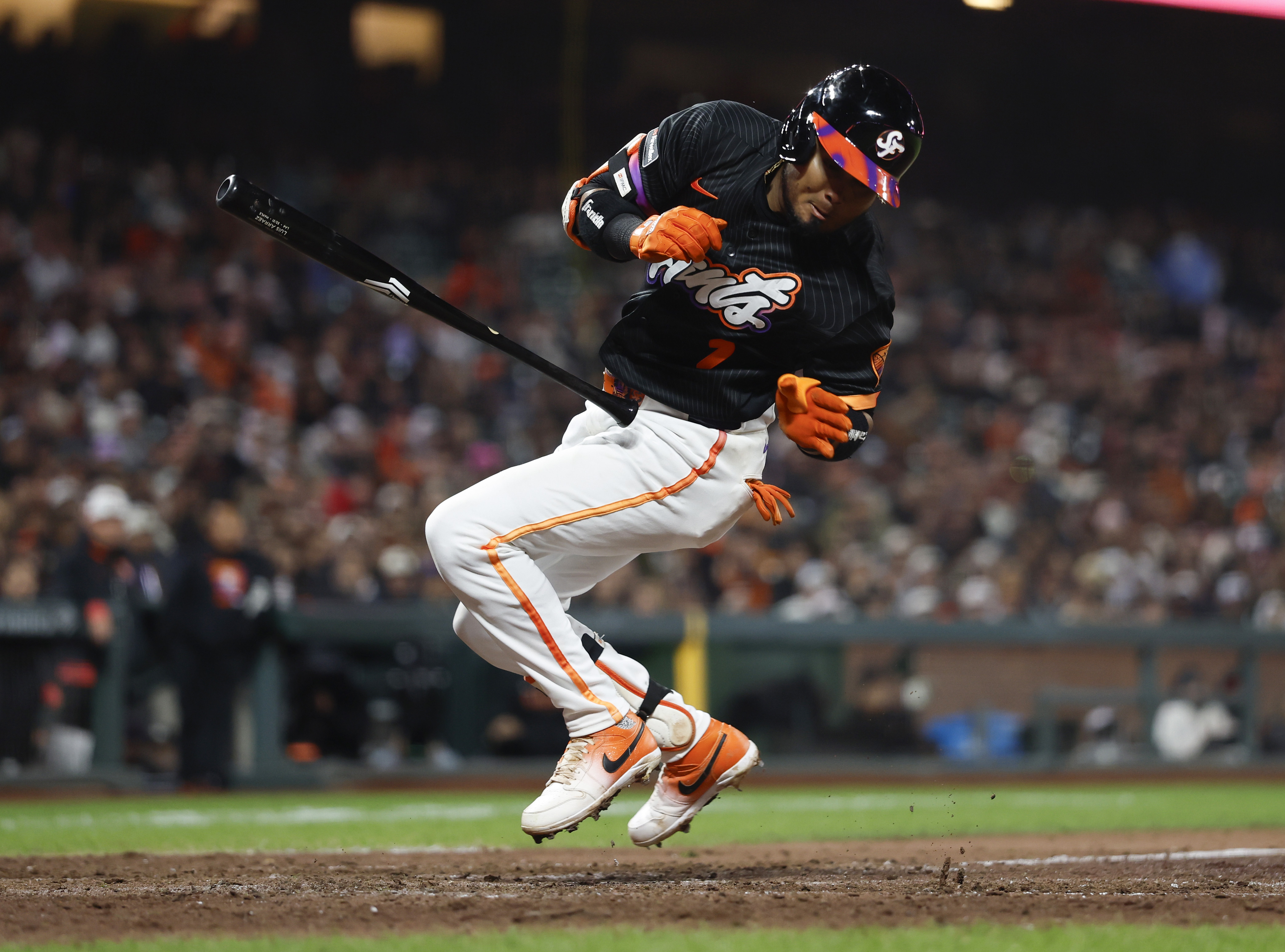 San Francisco Giants’ Luis Arraez (1) is brushed back by...