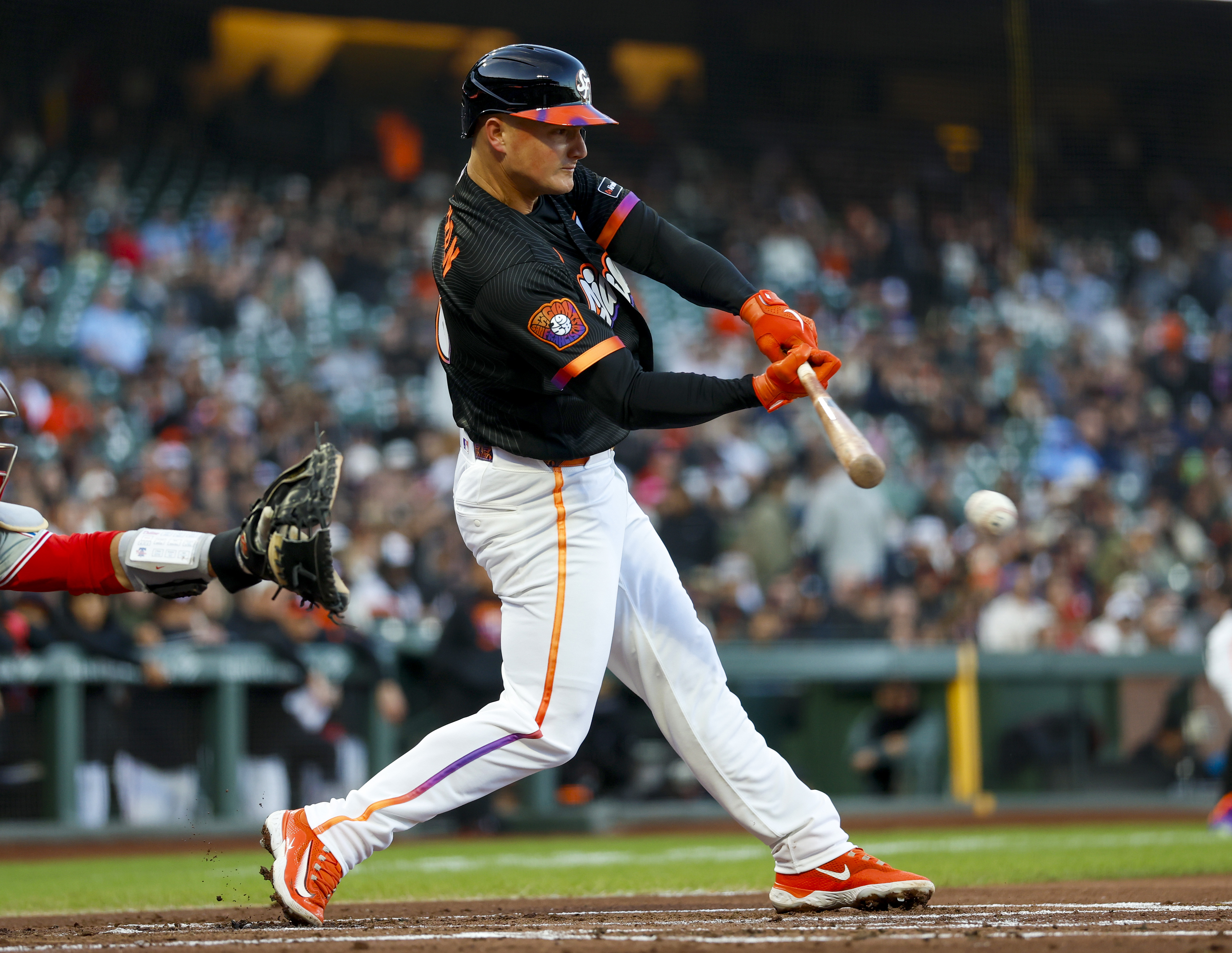 San Francisco Giants’ Matt Chapman (26) singles against the Philadelphia...