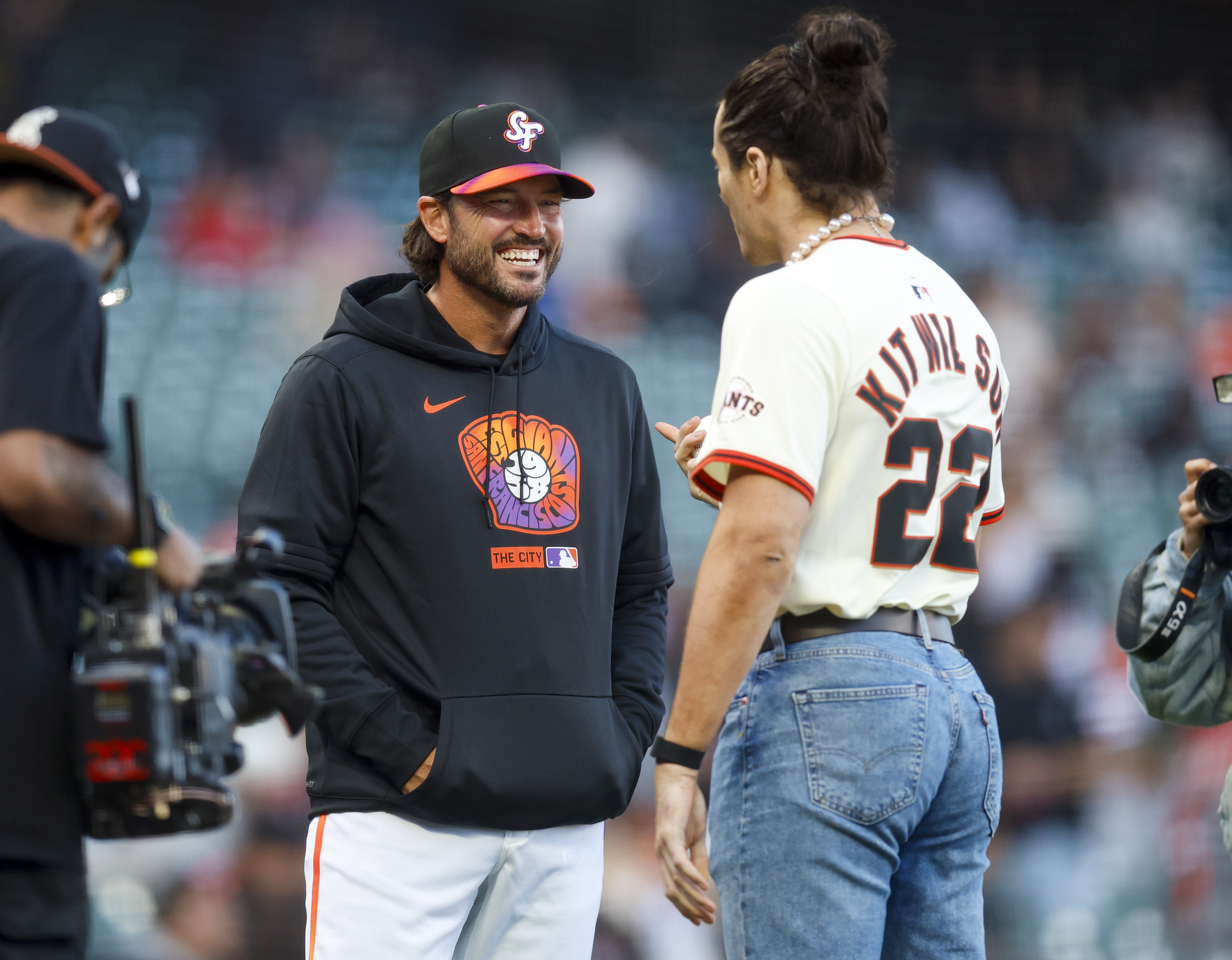 San Francisco Giants manager Tony Vitello chats with WWE wrestler...