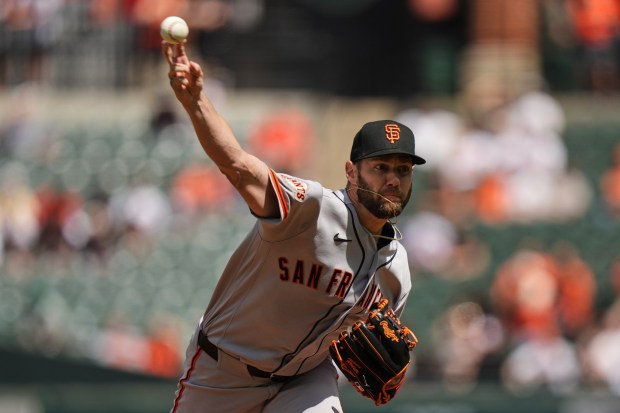 San Francisco Giants starting pitcher Adrian Houser delivers during the first inning of a baseball game against the Baltimore Orioles, Sunday, April 12, 2026, in Baltimore. (AP Photo/Stephanie Scarbrough)