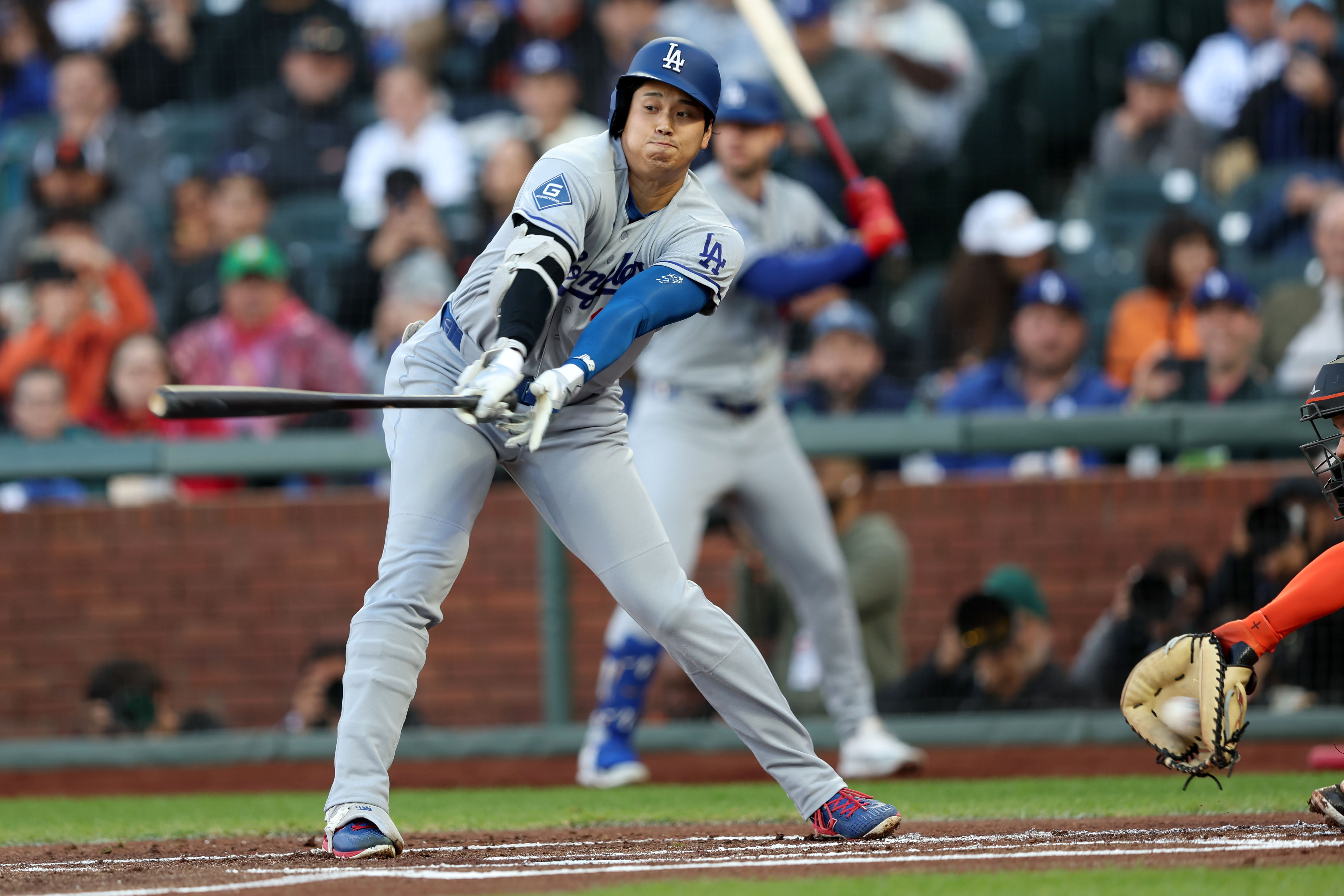 Los Angeles Dodgers’s Shohei Ohtani (17) strikes out against the...