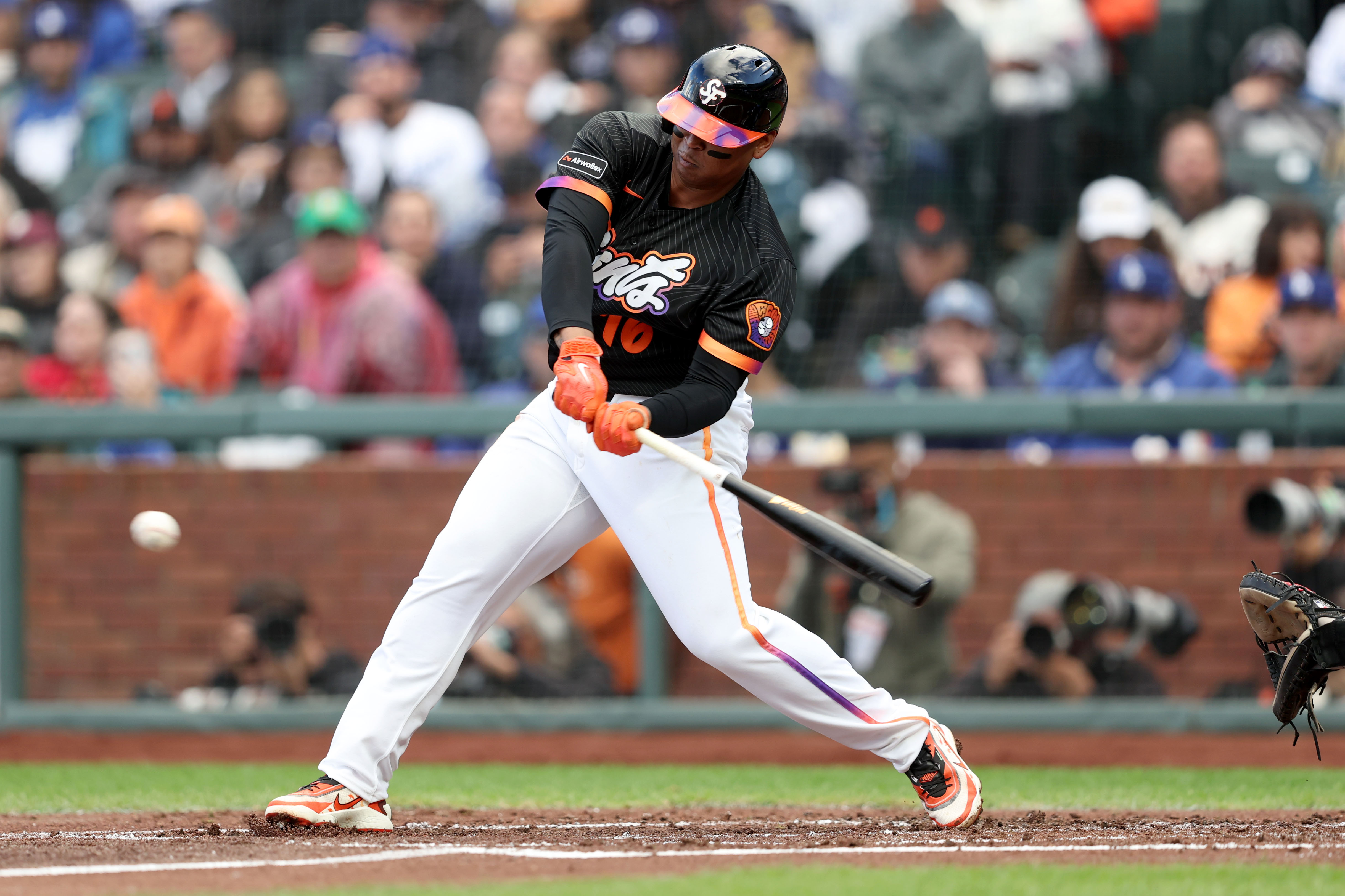 San Francisco Giants’ Rafael Devers (16) connects an RBI single...