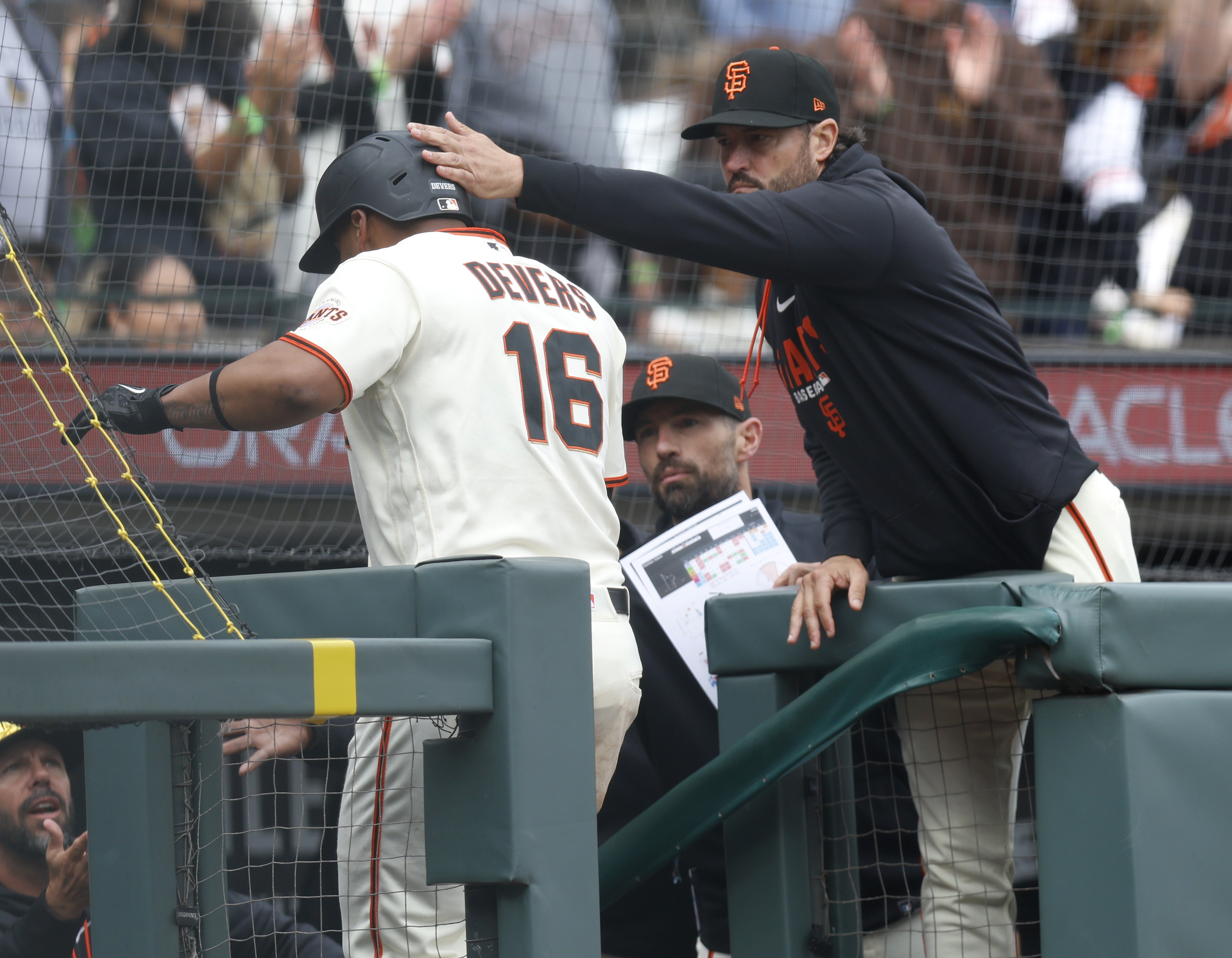 San Francisco Giants manager Tony Vitello congratulates San Francisco Giants’...