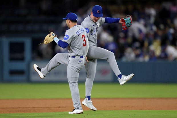 Cubs' Alex Bregman and Pete Crow-Armstrong celebrate after defeating the Dodgers at Dodger Stadium on April 24, 2026. (Photo by Luke Hales/Getty Images)