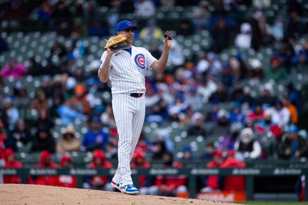 Chicago Cubs pitcher Matthew Boyd (16) has issues with his PitchCom during the third inning of a game against the Los Angeles Angels at Wrigley Field in Chicago on Wednesday, April 1, 2026. (Josh Boland/Chicago Tribune)