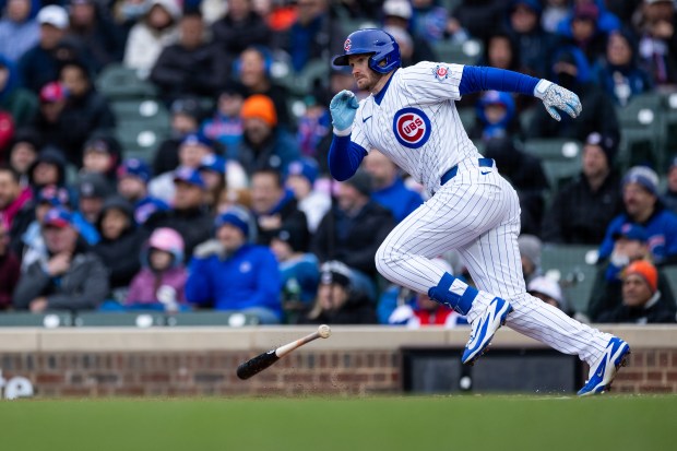 Chicago Cubs left fielder Ian Happ (8) runs towards first base during the third inning of a game against the Los Angeles Angels at Wrigley Field in Chicago on Wednesday, April 1, 2026. (Josh Boland/Chicago Tribune)