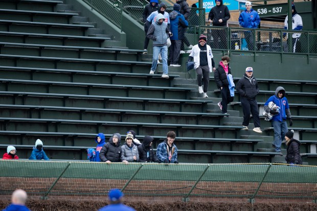 Chicago Cubs fans find their seats ahead of a game against the Los Angeles Angels at Wrigley Field in Chicago on Wednesday, April 1, 2026. (Josh Boland/Chicago Tribune)