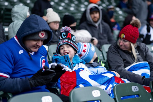 Chicago Cubs fans sit in the cold during a game against the Los Angeles Angels at Wrigley Field in Chicago on Wednesday, April 1, 2026. (Josh Boland/Chicago Tribune)