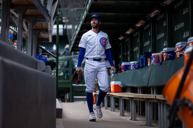 Chicago Cubs shortstop Dansby Swanson walks through the dugout ahead of a game against the Los Angeles Angels at Wrigley Field in Chicago on Wednesday, April 1, 2026. (Josh Boland/Chicago Tribune)