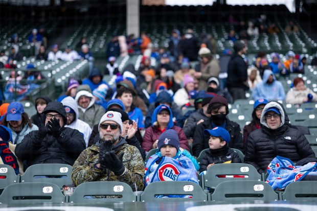 Chicago Cubs react as players are introduced to the starting lineup ahead of a game against the Los Angeles Angels at Wrigley Field in Chicago on Wednesday, April 1, 2026. (Josh Boland/Chicago Tribune)