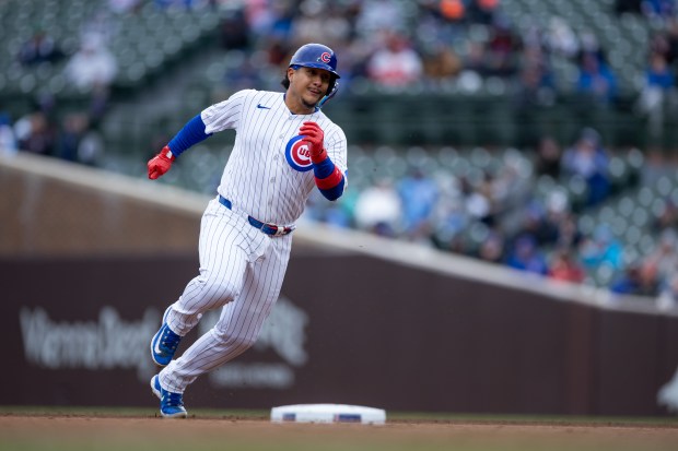 Chicago Cubs catcher Miguel Amaya runs to third base during the third inning of a game against the Los Angeles Angels at Wrigley Field in Chicago on Wednesday, April 1, 2026. (Josh Boland/Chicago Tribune)