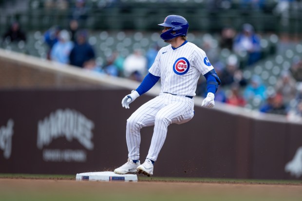 Chicago Cubs second baseman Nico Hoerner is safe on second base during the third inning of a game against the Los Angeles Angels at Wrigley Field in Chicago on Wednesday, April 1, 2026. (Josh Boland/Chicago Tribune)