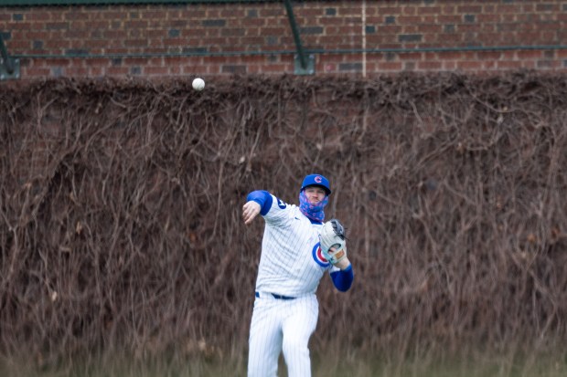 Chicago Cubs left fielder Ian Happ throws a ball in from the outfield during the sixth inning of a game against the Los Angeles Angels at Wrigley Field in Chicago on Wednesday, April 1, 2026. (Josh Boland/Chicago Tribune)