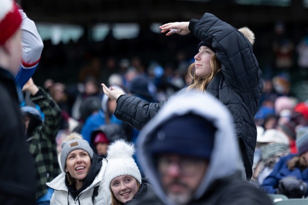 A fan dances during the sixth inning of a game between the Chicago Cubs and the Los Angeles Angels at Wrigley Field in Chicago on Wednesday, April 1, 2026. (Josh Boland/Chicago Tribune)