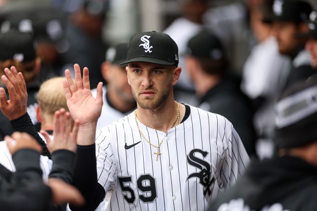 Chicago White Sox pitcher Sean Burke (59) walks through the dugout after pitching during the first inning against the Los Angeles Angels on Opening Day at Rate Field Thursday March 27, 2025, in Chicago. (Armando L. Sanchez/Chicago Tribune)