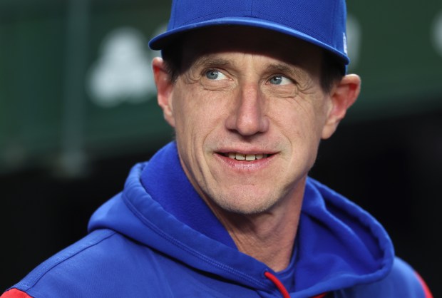 Cubs manager Craig Counsell stands in the dugout before a game against the Angels on March 31, 2026, at Wrigley Field. (Chris Sweda/Chicago Tribune)