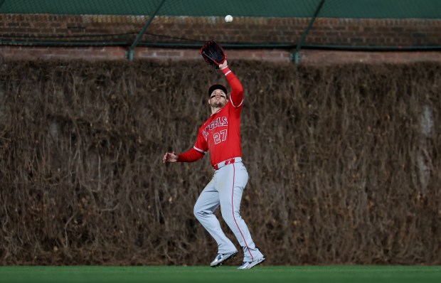Los Angeles Angels center fielder Mike Trout (27) catches a fly ball hit by Chicago Cubs second baseman Nico Hoerner in the ninth inning of a game at Wrigley Field in Chicago on March 31, 2026. (Chris Sweda/Chicago Tribune)