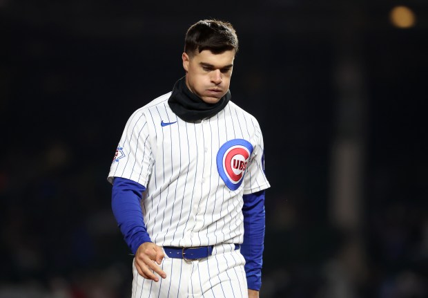 Chicago Cubs right fielder Matt Shaw walks back to the dugout after flying out to end the seventh inning of a game against the Los Angeles Angels at Wrigley Field in Chicago on March 31, 2026. (Chris Sweda/Chicago Tribune)