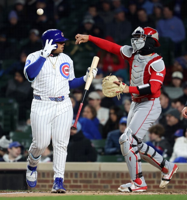 Chicago Cubs designated hitter Moisés Ballesteros walks back to the dugout after striking out in the second inning of a game against the Los Angeles Angels at Wrigley Field in Chicago on March 31, 2026. (Chris Sweda/Chicago Tribune)