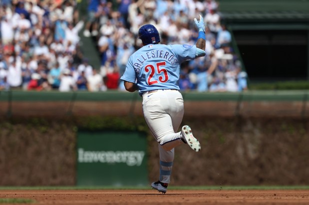 Chicago Cubs designated hitter Moisés Ballesteros (25) celebrates as he rounds the bases after hitting a three-run homer in the first inning of a game against the New York Mets at Wrigley Field in Chicago on April 17, 2026. (Chris Sweda/Chicago Tribune)