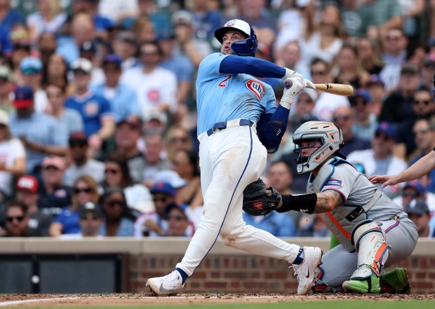 Chicago Cubs second baseman Nico Hoerner (2) hits a two-run home run in the second inning of a game against the New York Mets at Wrigley Field in Chicago on April 17, 2026. (Chris Sweda/Chicago Tribune)