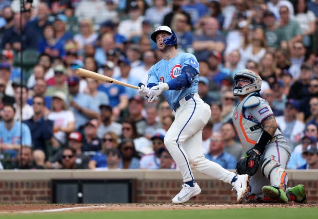 Chicago Cubs second baseman Nico Hoerner (2) hits a two-run home run in the second inning of a game against the New York Mets at Wrigley Field in Chicago on April 17, 2026. (Chris Sweda/Chicago Tribune)