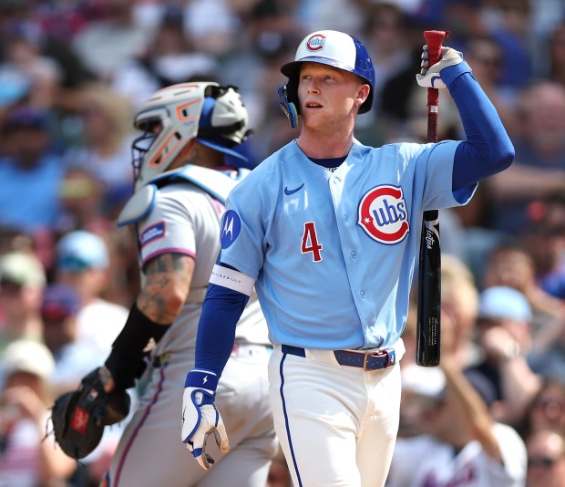 Chicago Cubs center fielder Pete Crow-Armstrong (4) walks back to the dugout after striking out to end the fifth inning of a game against the New York Mets at Wrigley Field in Chicago on April 17, 2026. (Chris Sweda/Chicago Tribune)