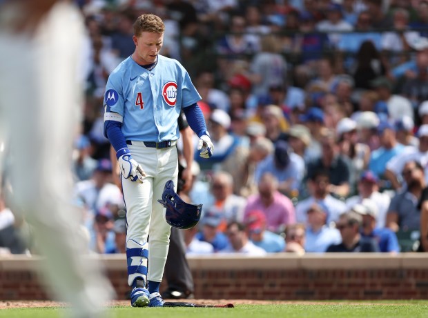 Chicago Cubs center fielder Pete Crow-Armstrong (4) drops his helmet to the ground after striking out to end the fifth inning of a game against the New York Mets at Wrigley Field in Chicago on April 17, 2026. (Chris Sweda/Chicago Tribune)