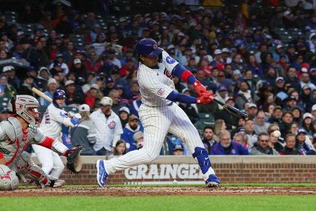 Cubs catcher Miguel Amaya (9) grounds into a double play allowing Cubs left fielder Ian Happ (8) to score during the second inning against the Phillies at Wrigley Field April 20, 2026, in Chicago. (Armando L. Sanchez/Chicago Tribune)