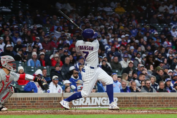 Cubs shortstop Dansby Swanson (7) hits a three run homer during the second inning against the Phillies at Wrigley Field April 20, 2026, in Chicago. (Armando L. Sanchez/Chicago Tribune)