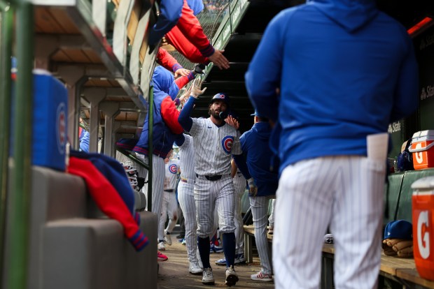 Cubs shortstop Dansby Swanson (7) celebrates in the dugout after hitting a three run homer during the second inning against the Phillies at Wrigley Field April 20, 2026, in Chicago. (Armando L. Sanchez/Chicago Tribune)