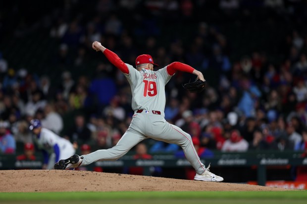 Phillies pitcher Kyle Backhus (19) pitches during the fifth inning against the Cubs at Wrigley Field April 20, 2026, in Chicago. (Armando L. Sanchez/Chicago Tribune)